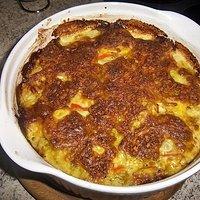 Ein leckeres herbstgericht: kürbisgratin mit pesto-kruste