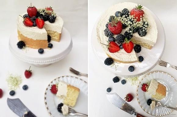 Cremiger cheesecake mit luftigen biskuitboden und frischen sommerfrüchten