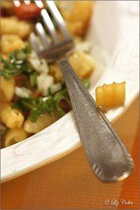 Riccioli mit zwiebel-petersilien-vinaigrette und california almonds