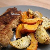 Wellsfilet in senfhülle mit kürbis vom blech