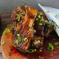 Fall-off-the bone baked bbq beef ribs, homemade bbq sauce & french fries