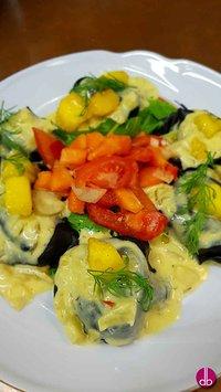Tortelloni neri mit Mango-Fenchel-Gemüse und Safranschaum
