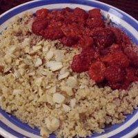 Orangen-Lebkuchen-Couscous mit heißen Himbeeren und Paranüssen (vegan)