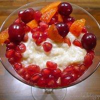 Milchreis mit Granatapfel, roten Trauben, Blutorange und Zimt