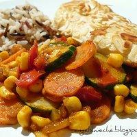 Mandel-Hähnchenbrust auf buntem Curry-Gemüse
