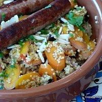 Wunschperpeduum mobile und couscous-curry mit möhren, nüssen und merguez