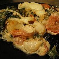 Gnocchi-Spinatauflauf mit Tomaten und Mozarella