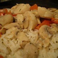 Jakobsmuscheln mit weißer Sauce und Reis